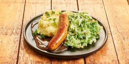 Gebraden worst met andijvie en aardappelpuree