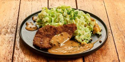 Stamppot van prei met schnitzel en pepersaus