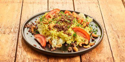 Spitskoolschotel met cashewnoten en vega gehakt