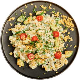 Pastaschelpjes met courgette en bonen in roomsaus