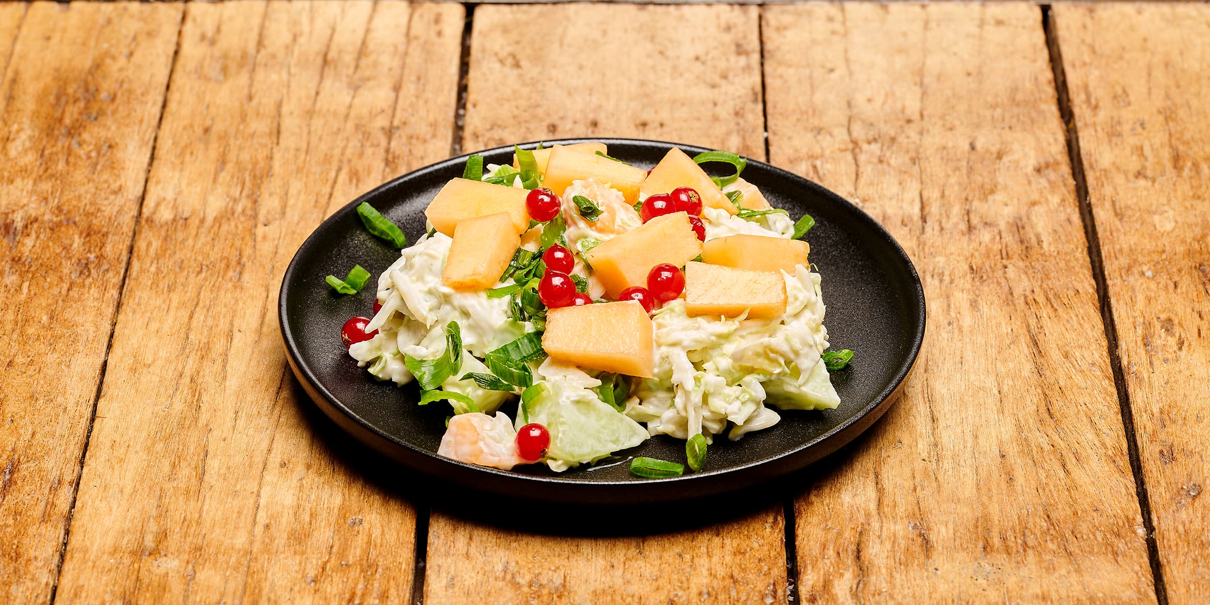 Franse salade van meloen en perzik (250 ml)