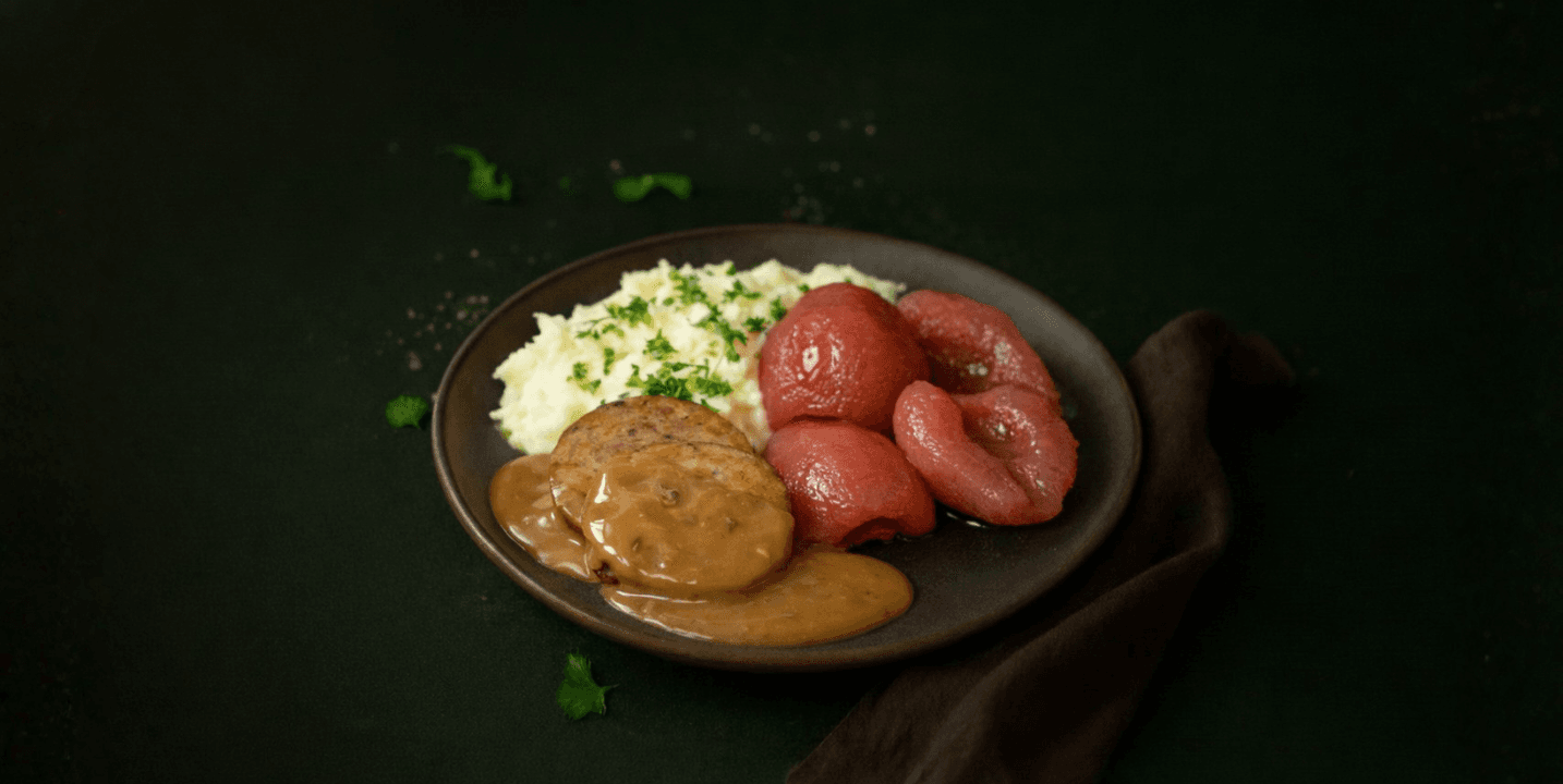 Rollade in honing-tijmsaus met stoofpeertjes en aardappelpuree
