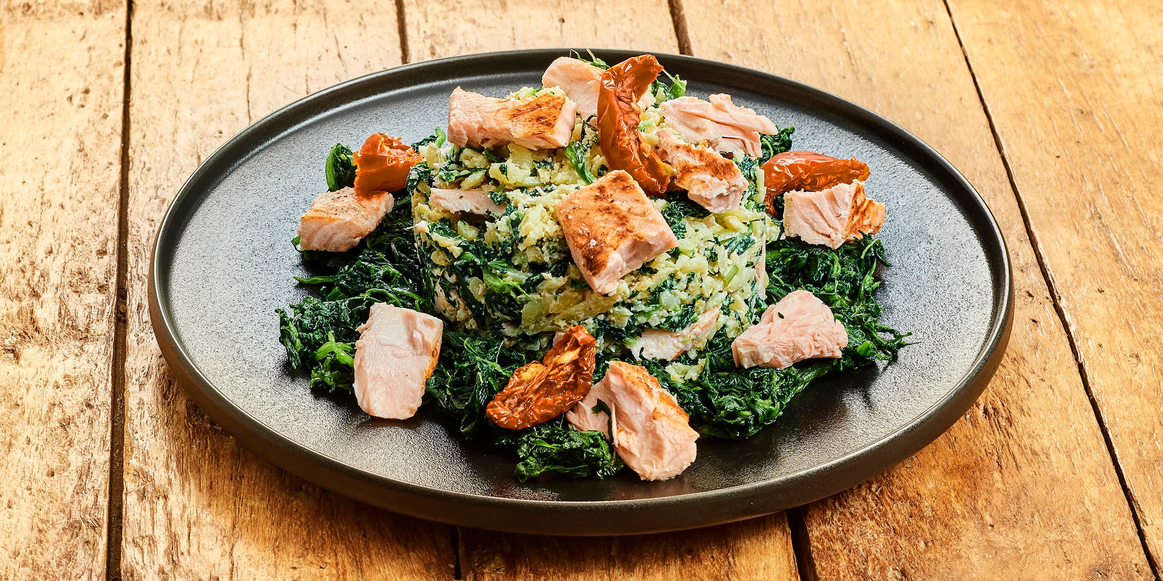 Rösti van aardappel met zalm, spinazie en kaas