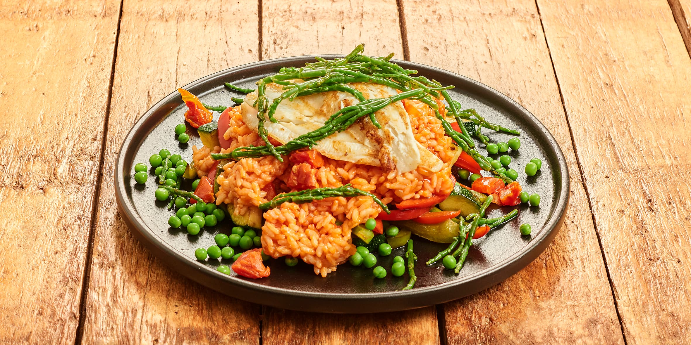Risotto dolcevita met tomaat en witvis