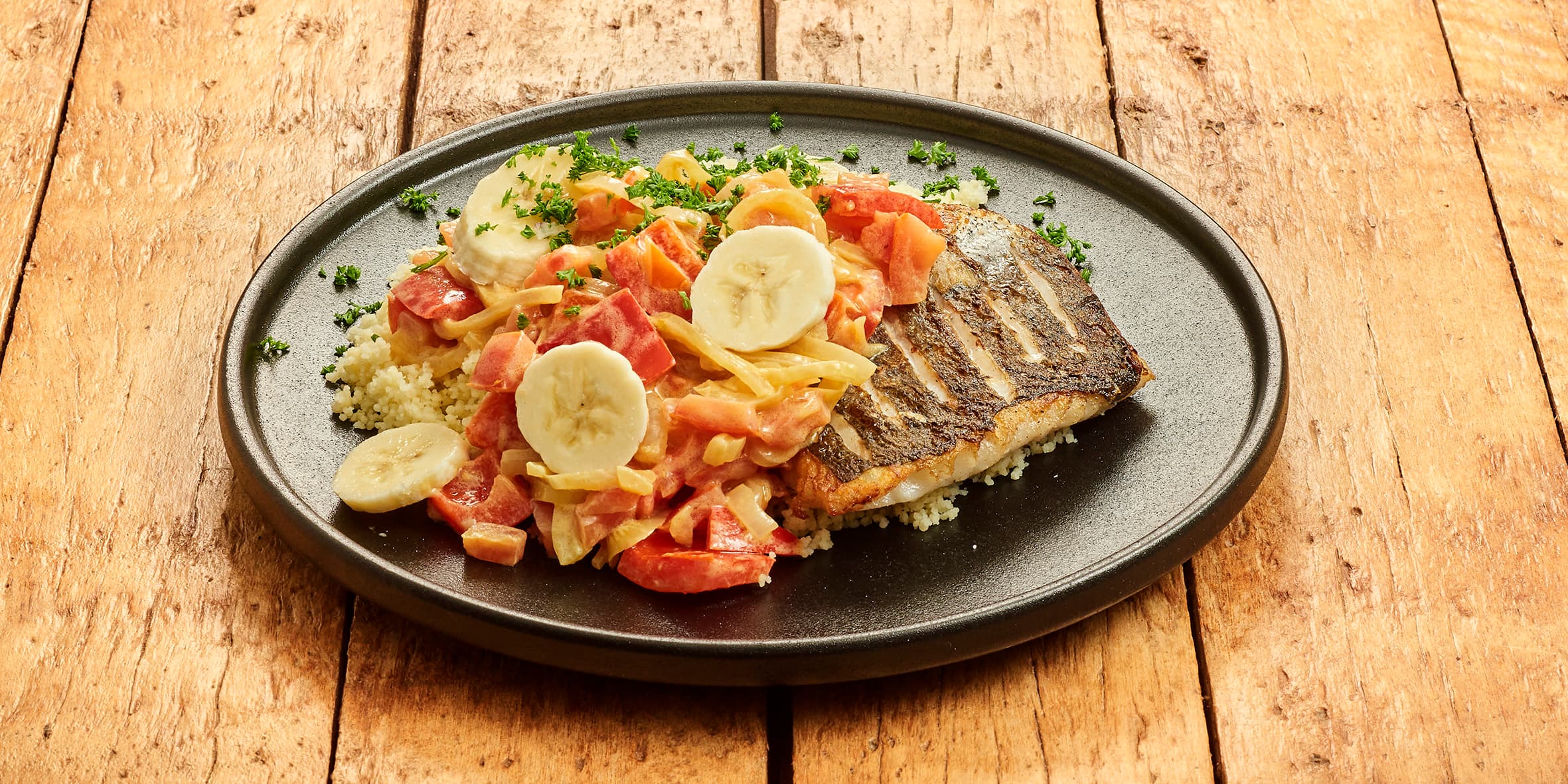 Gebakken witvis met couscous en uiensaus