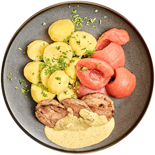 Rollade in mosterdsaus met aardappelen en stoofpeertjes