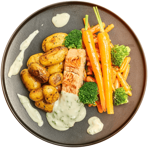 Zalm in botersaus met worteltjes en krieltjes