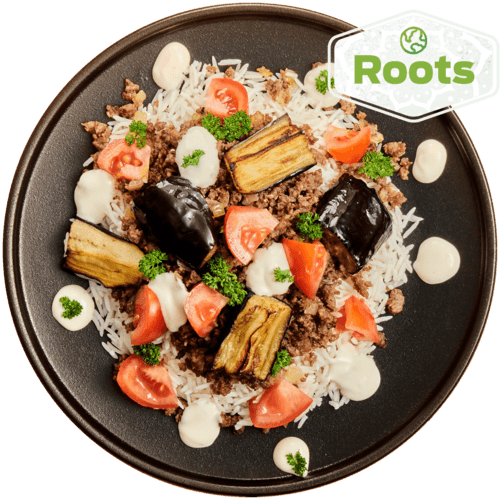 Koerdische schotel met aubergine, tomaat en knoflooksaus