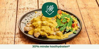 Gele curry met kipstukjes, groenten en Bloemkoolrijst