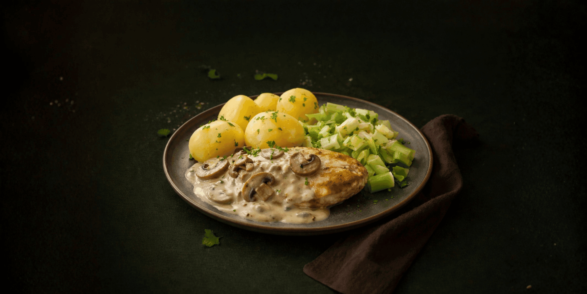 Kipfilet in romige champignonsaus met prei