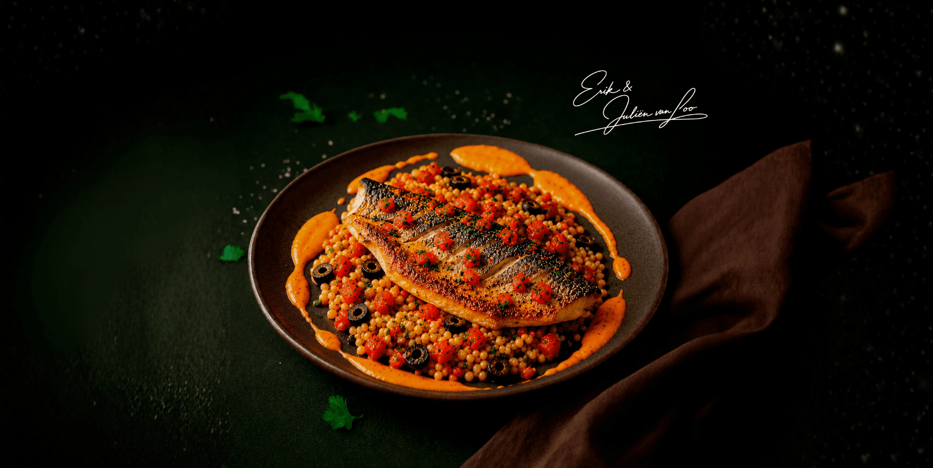 Dorade met een paella van parelgort, chorizo en paprikasaus