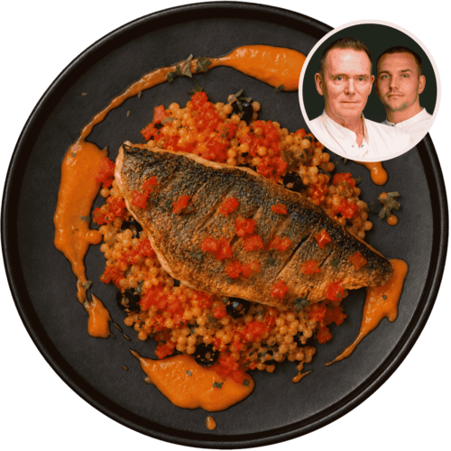 Dorade met een paella van parelgort, chorizo en paprikasaus