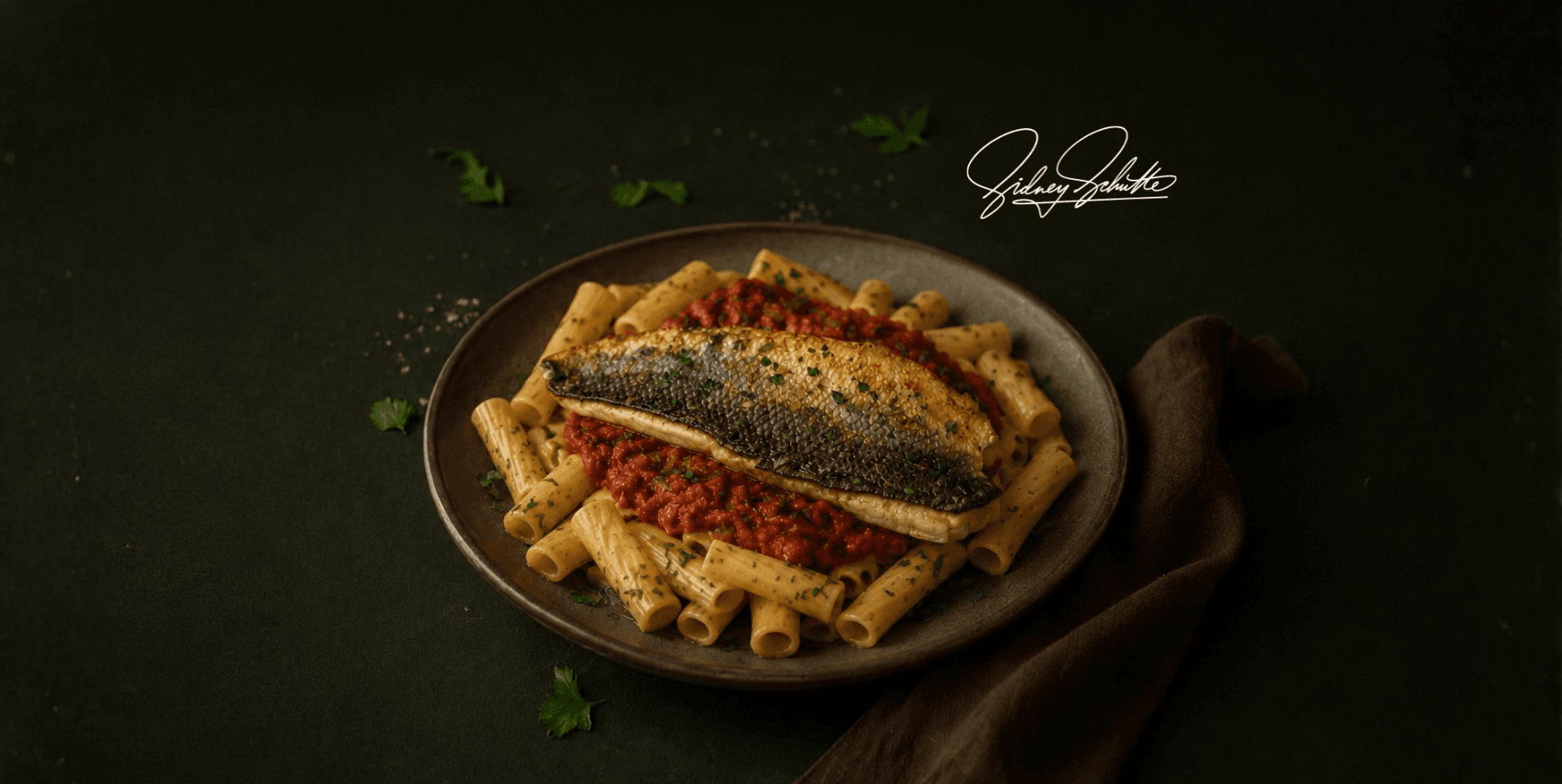 Zeebaars met dillepiperade en rigatoni pasta