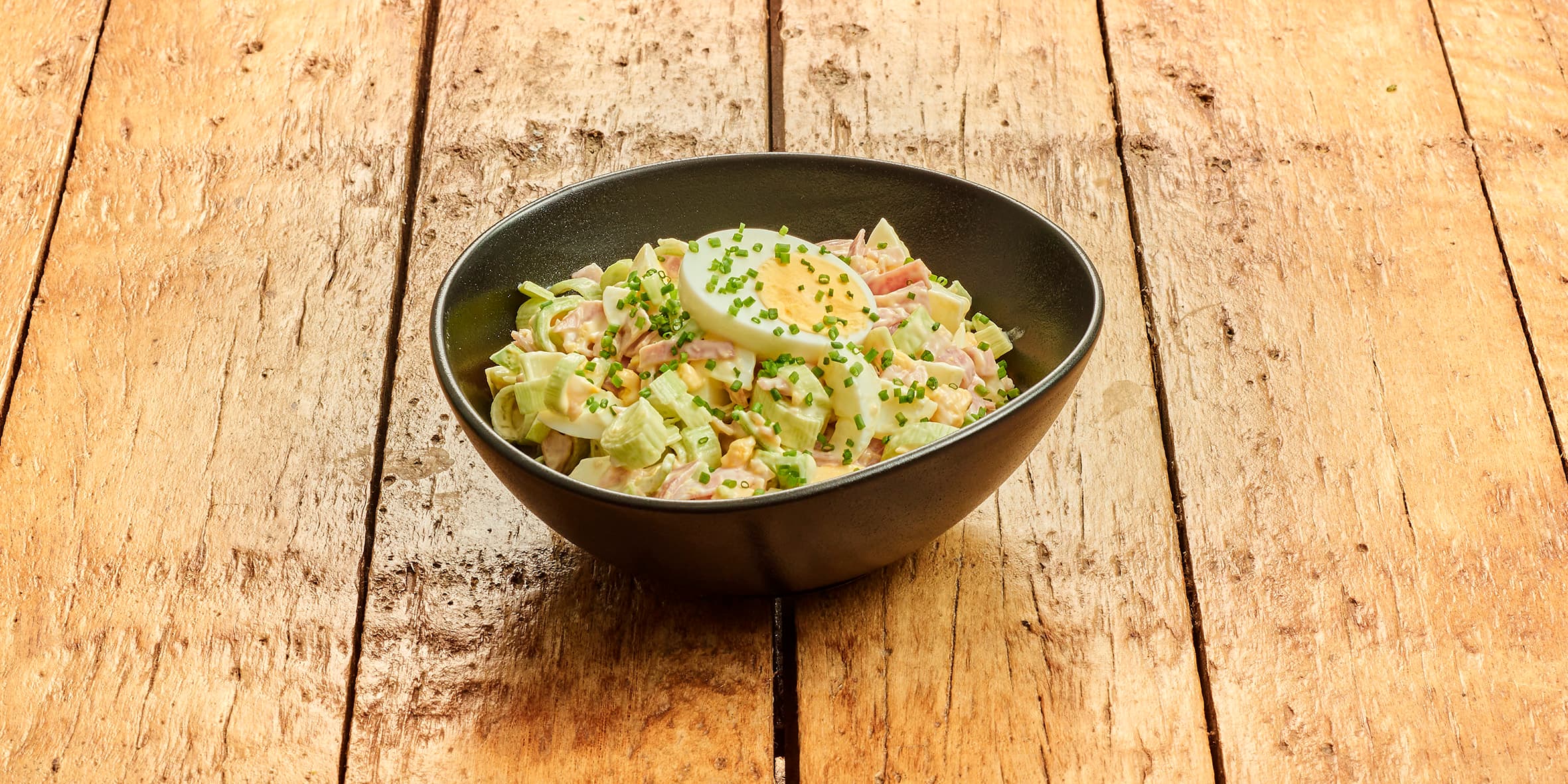Lekkerbeksalade met ham, prei en ei