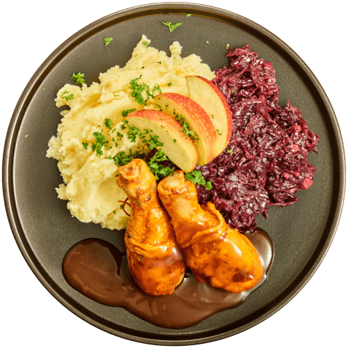 Drumsticks in jus met rodekool en aardappelpuree