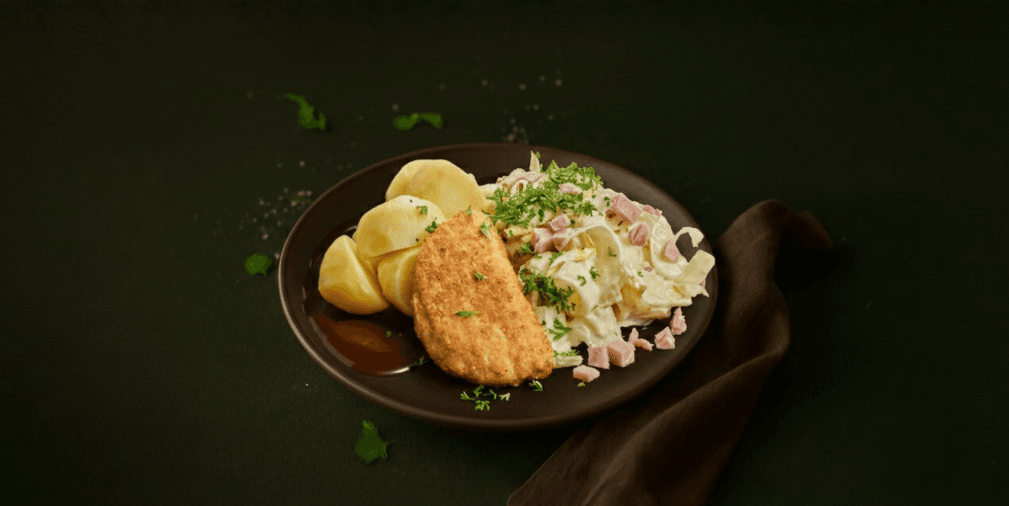 Cordon bleu met witlof in hollandaisesaus en aardappelen