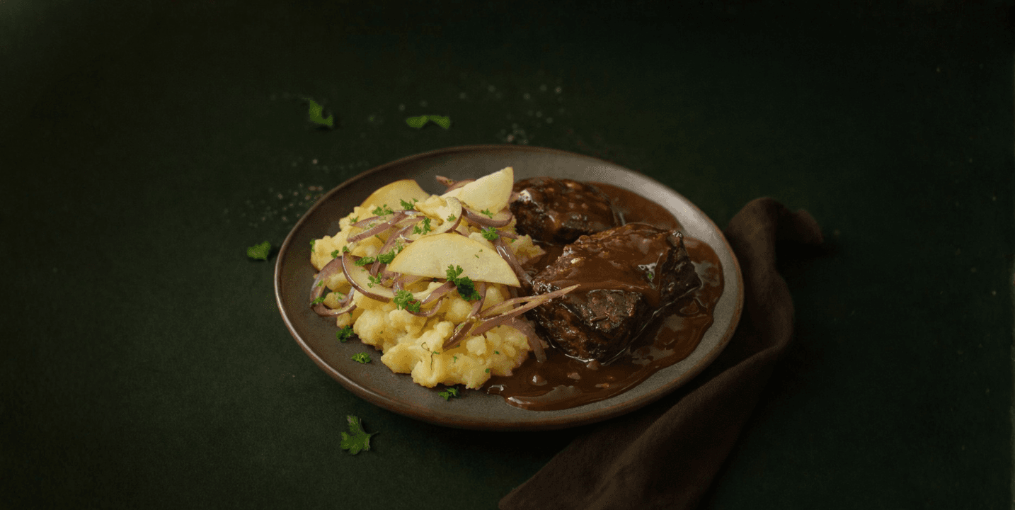 Stamppot hete bliksem met runderlapjes in jus