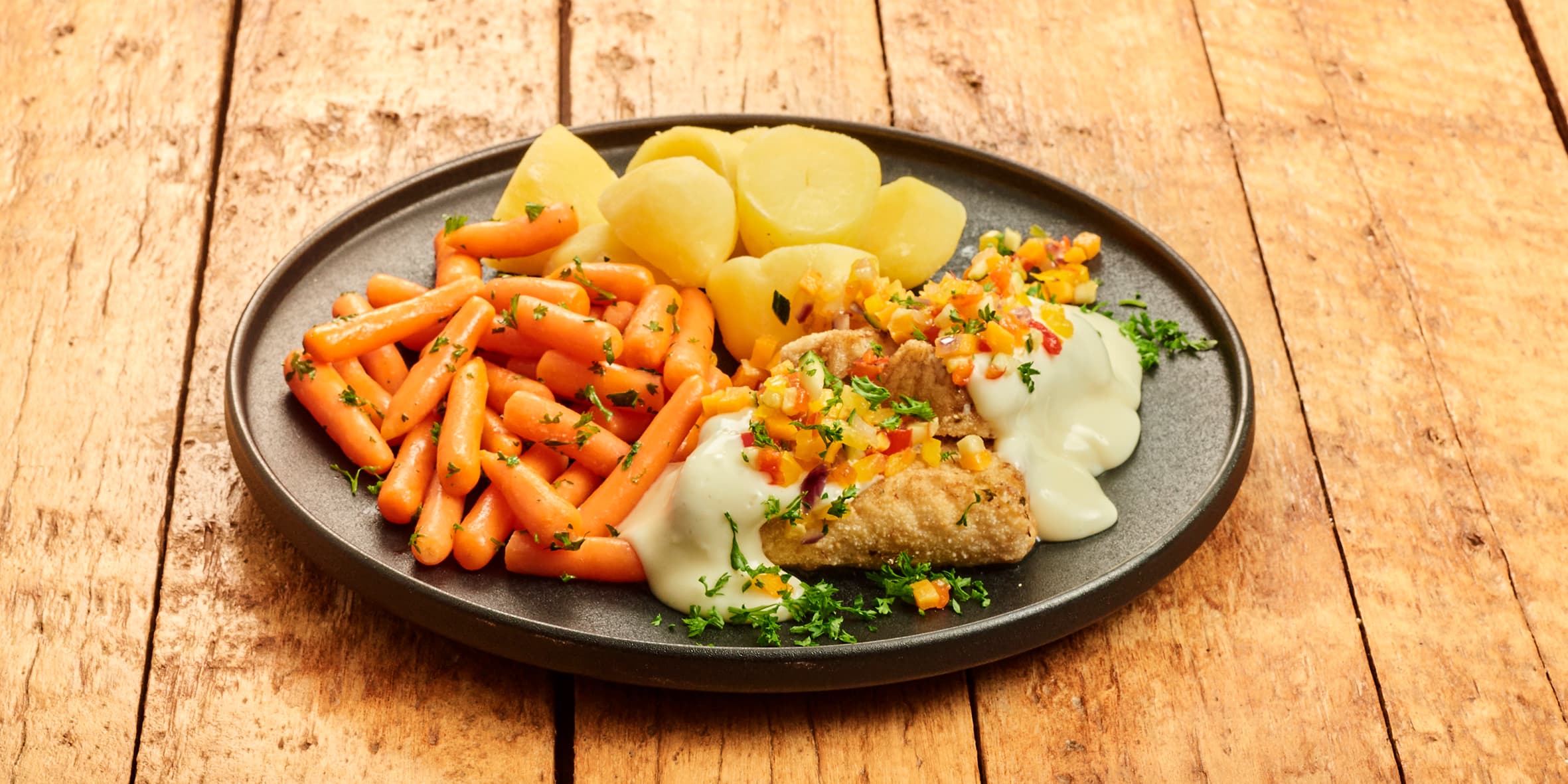 Kabeljauw met hollandaise, aardappel en bospeen