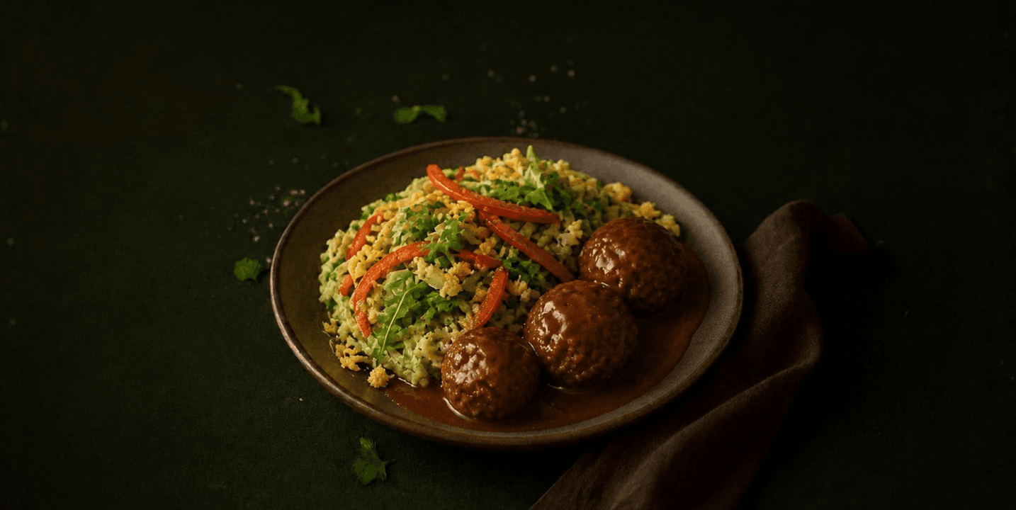 Stamppot andijvie met rucola, paprika, ei en gehaktballen