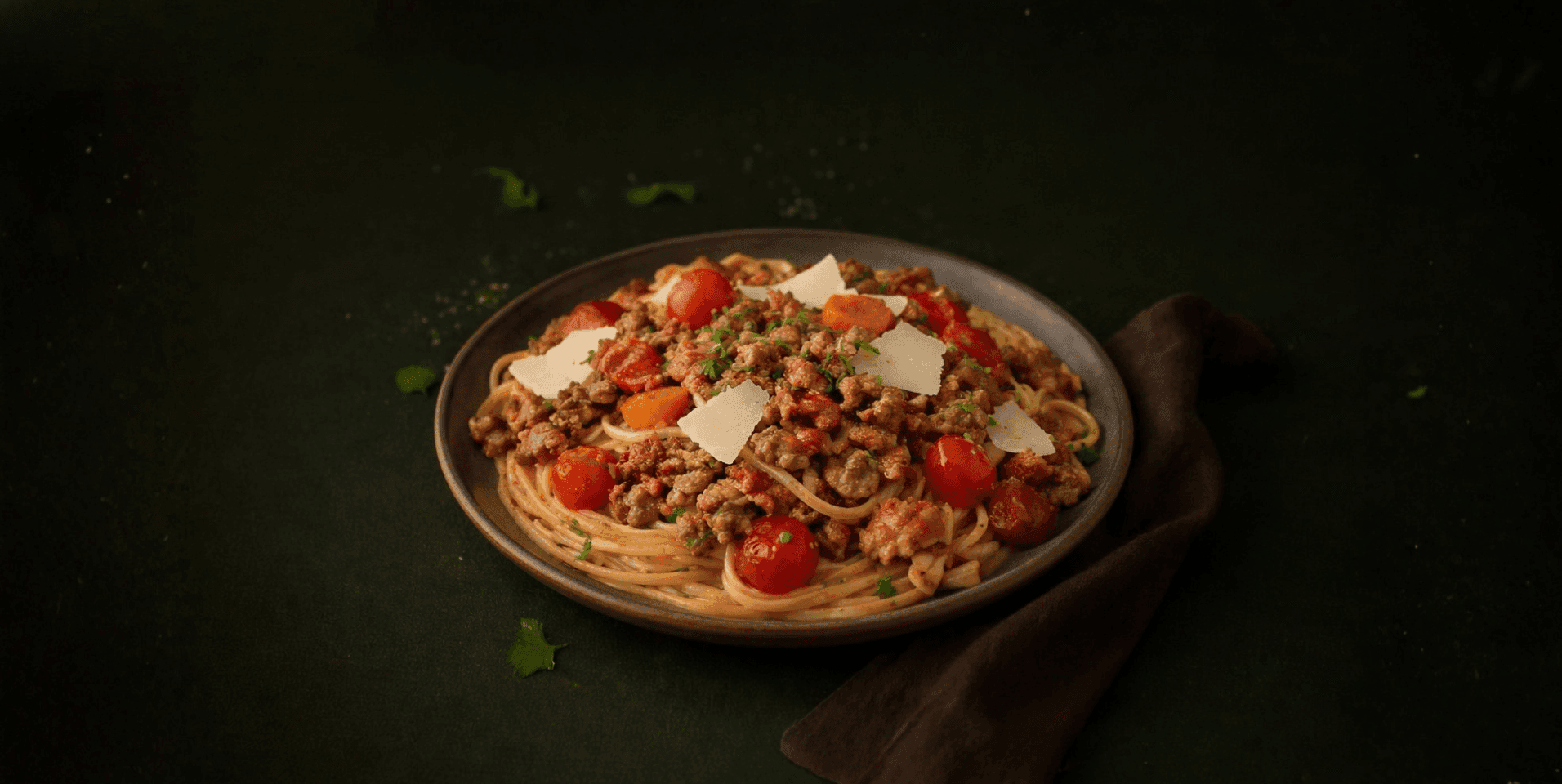 Spaghetti bolognese met spekjes en kaas