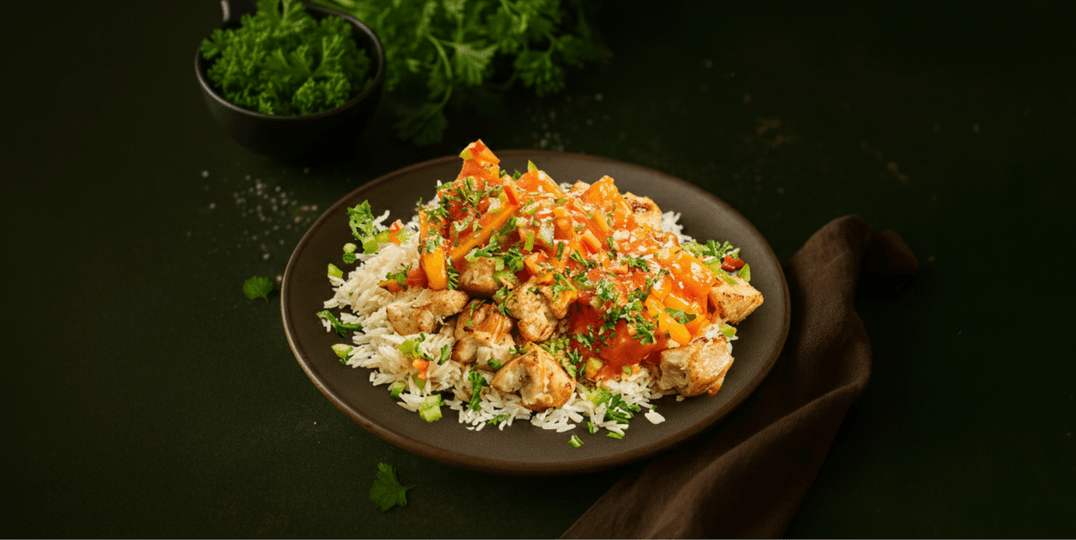 Kip pilav met perzik, paprika en rijst