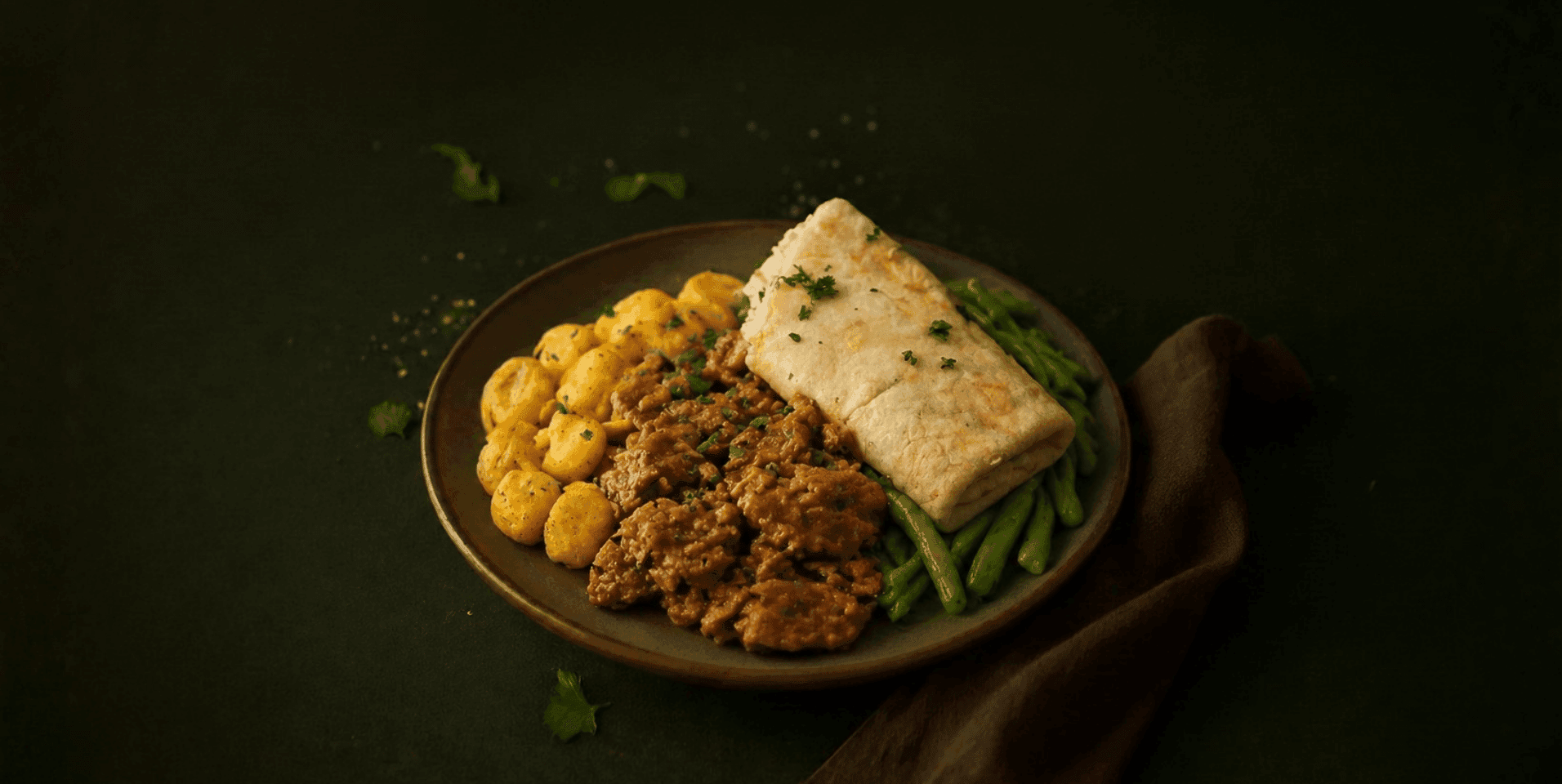 Surinaamse roti met kip, sperziebonen en aardappelen