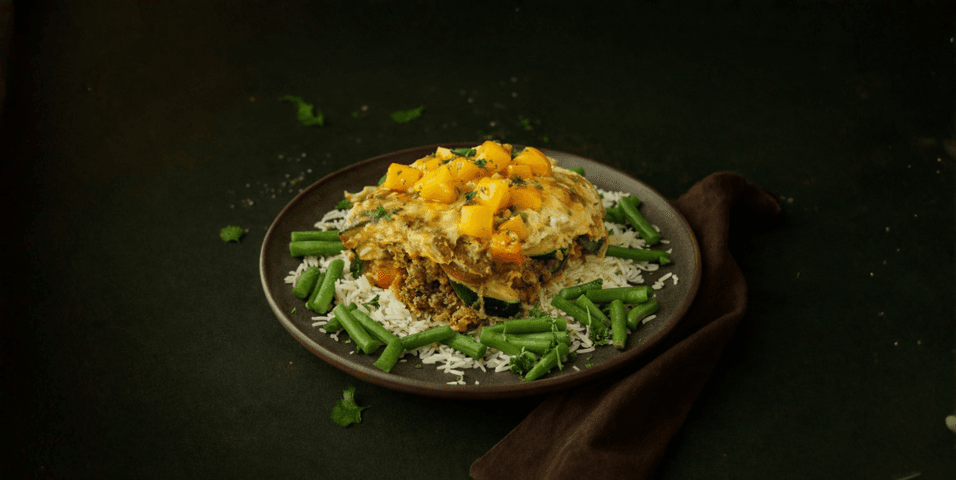 Bobotie met sperziebonen, mangochutney en rijst