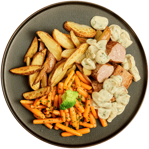 Varkenshaas met champignonsaus, roseval en worteltjes