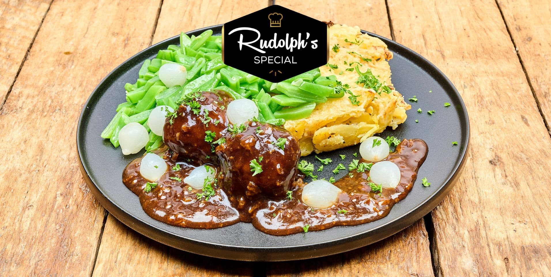 Gehaktballen in ketjapjus met koolrabi-aardappelgratin